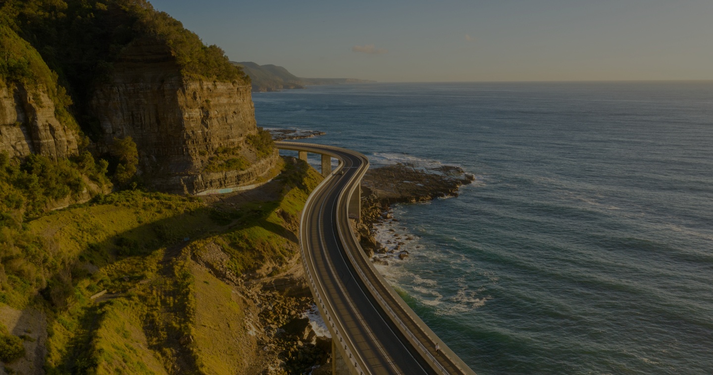A winding highway over a cliff