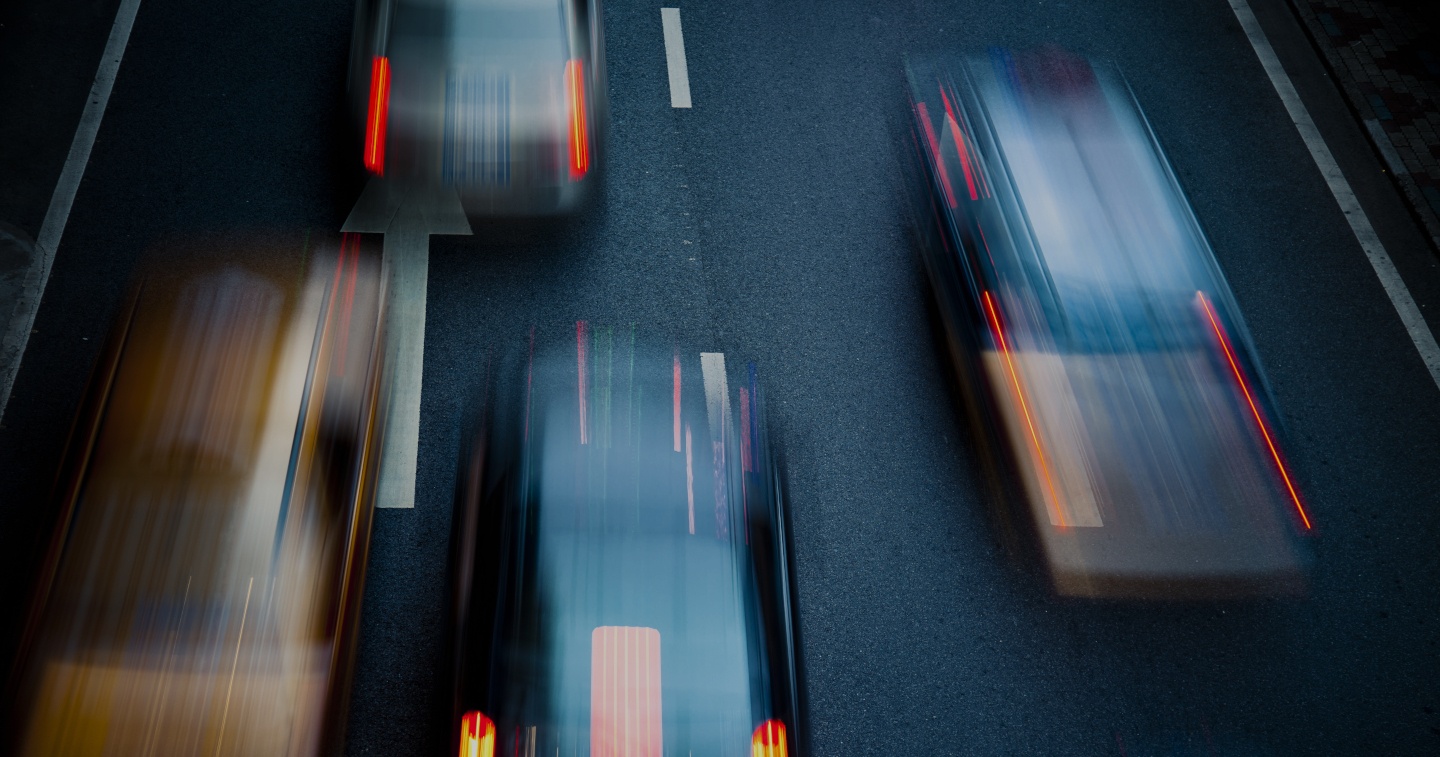 Fast cars driving on a road